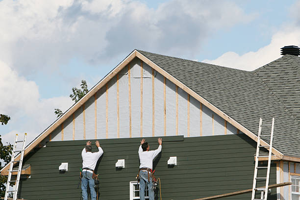 Professional Siding Installation technician working in Springfield, PA